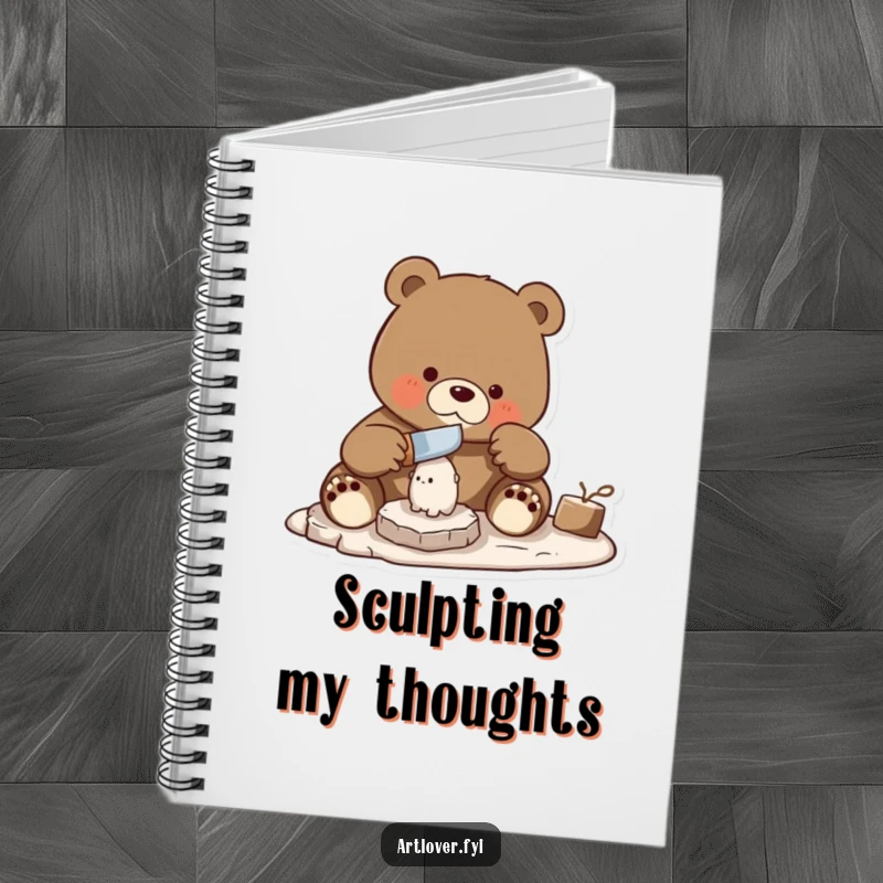 Funny bear skillfully using a chisel to carve a small statue, on the cover of a creative artisan's notebook.