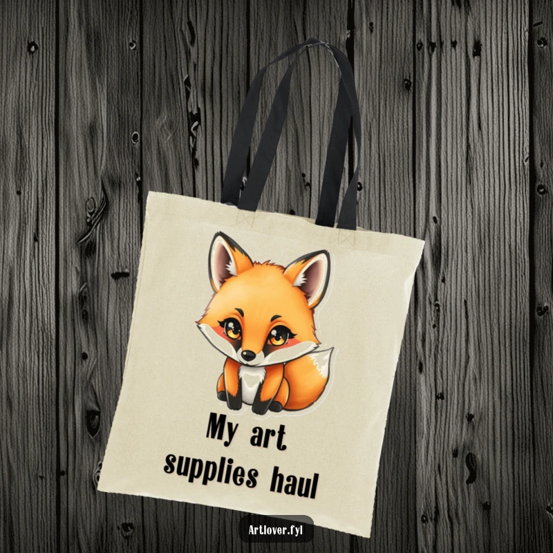 Funny fox intensely focused on drawing with a charcoal stick, featured on a spacious and artistic tote bag.