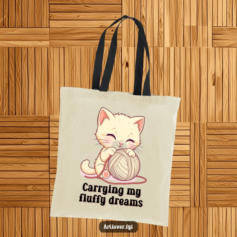 Funny kitten tote bag, a sweet cat hilariously trying to sculpt a large ball of yarn, bringing smiles everywhere.
